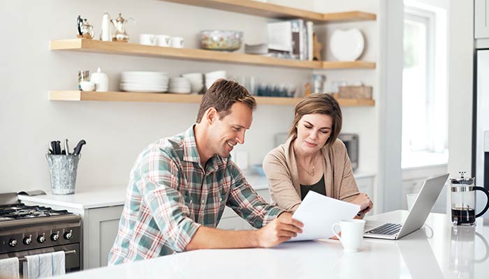 Couple budgeting to achieve their goals for financial planner Townsville